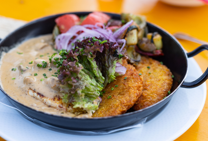 A warm dinner dish in a pan.